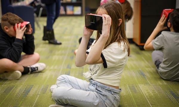 Students use virtual reality headsets